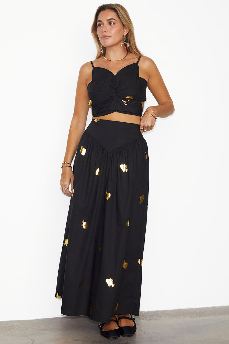 Black crop top outlet and golden skirt